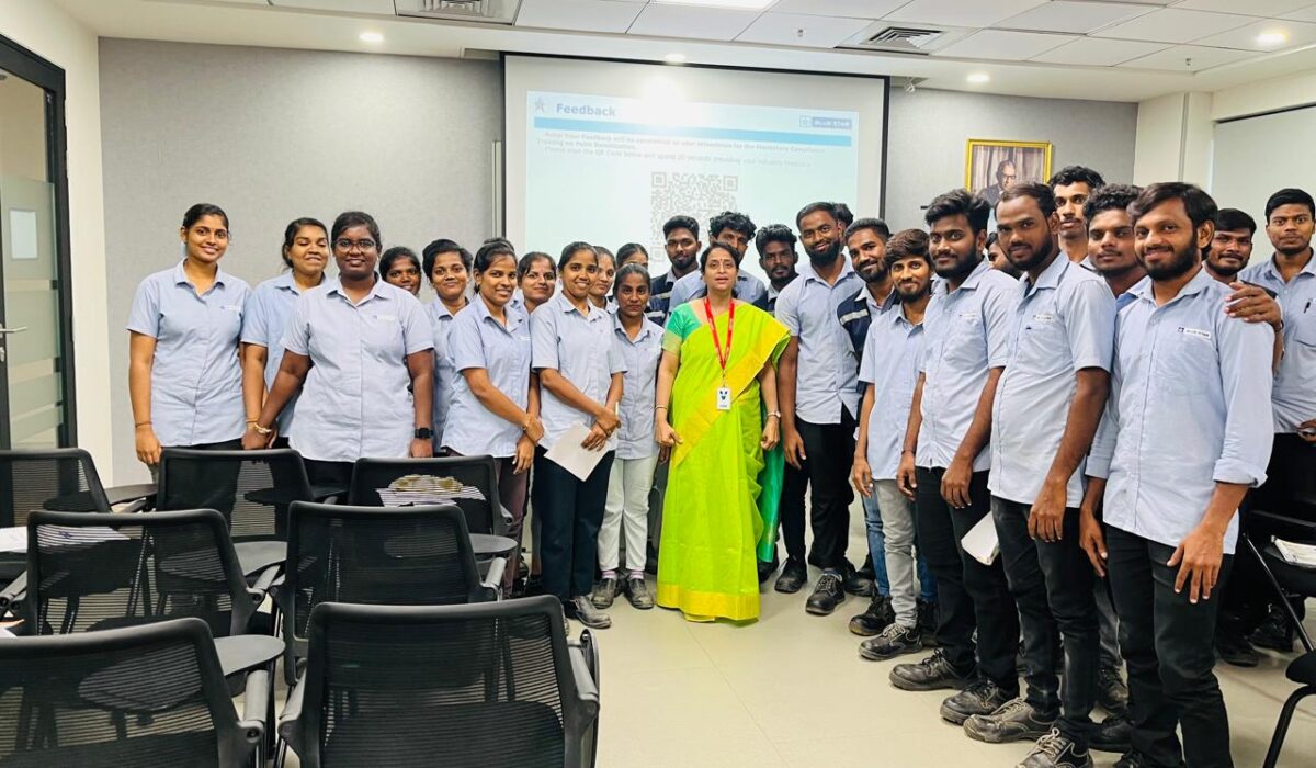 Trainer leading POSH training session for employees in a corporate setting