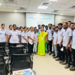 Trainer leading POSH training session for employees in a corporate setting