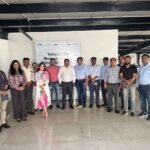 Corporate trainer conducting business leadership course for employees